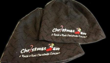 two knit beanies with the christmas jam production logo embroidered on them